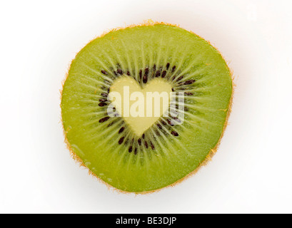 Kiwi (Actinidia deliciosa), en forme de coeur Banque D'Images