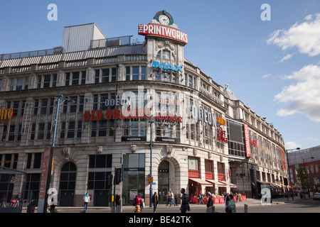 Corporation Street, Manchester, Angleterre, Royaume-Uni, Europe. La construction et de l'horloge Printworks, dans le centre-ville Banque D'Images