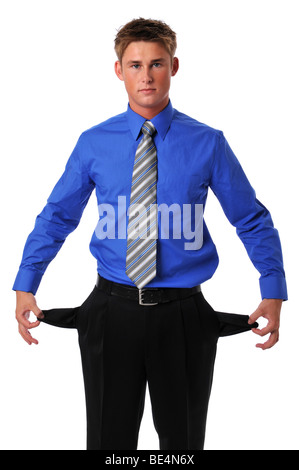 Young businessman showing vide poches comme un symbolisme Banque D'Images
