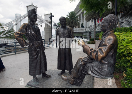 La rivière marchands, sculpture en bronze de aw Tee Hong, Flint Street, Fullerton Square, Singapour, en Asie du sud-est Banque D'Images