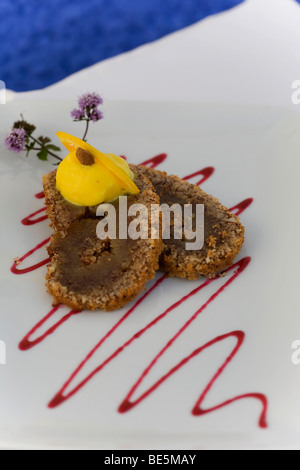 Gâteau aux amandes, sorbet orange avec un restaurant Eira do Mel, Vila do Bispo, Algarve, Portugal, Europe Banque D'Images