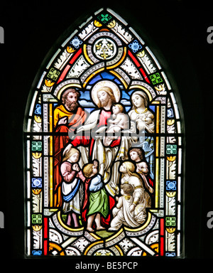 Vitrail représentant Jésus avec les enfants, St John the Baptist Church, South Carlton, Lincolnshire Banque D'Images