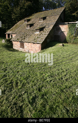 Ville de Nether Alderley, Angleterre. Le National Trust gérée Elizabethan moulin à eau, Nether Alderley Mill, près de Alderley Edge. Banque D'Images