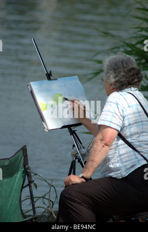 Femme d'âge moyen d'une peinture aquarelle, Christchurch, England, UK Banque D'Images