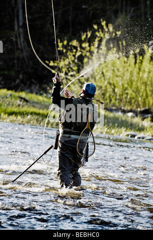 Vue arrière d'un man fishing Banque D'Images