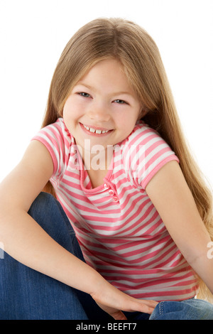 Studio Portrait of Smiling Girl Banque D'Images