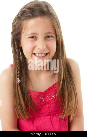 Studio Portrait of Smiling Girl Banque D'Images