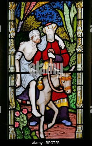 Une vitrail de Frederick Preedy représentant l'histoire Du Bon Samaritain, de St Mary la Vierge, Gunthorpe, Norfolk Banque D'Images