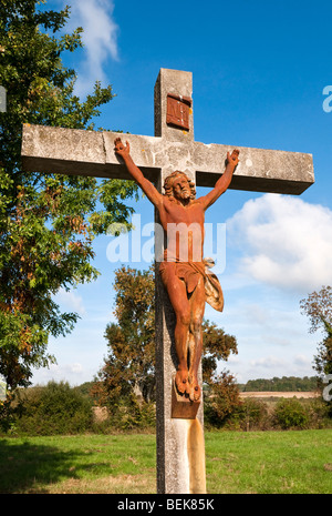 Calvaire en bordure / Christ en croix - Indre, France. Banque D'Images