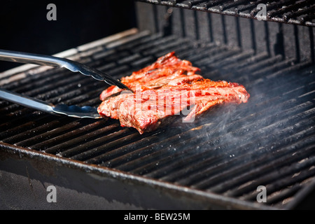 Pavé de boeuf cuisson Banque D'Images