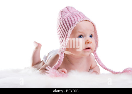 Portrait de trois mois d'hiver rose baby girl wearing hat Banque D'Images