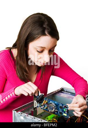 Jeune femme de la mise à niveau du matériel informatique Banque D'Images