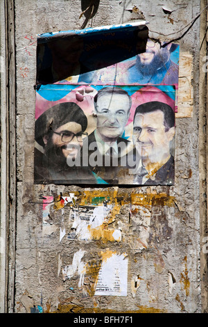 Poster avec Hafez al-Assad, Bashar al-Assad et Nasrallah (chef du Hezbollah a) sur un mur, à Damas, en Syrie, au Moyen-Orient Banque D'Images