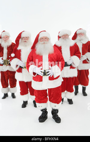 Groupe d'hommes habillés en Père Noël Banque D'Images