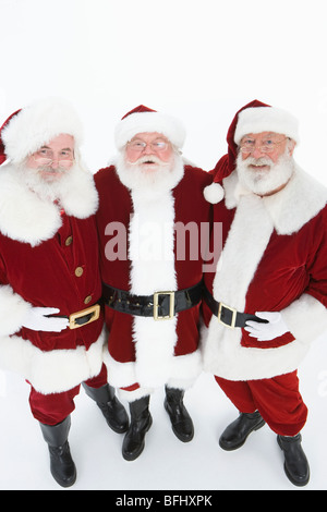 Groupe d'hommes habillés en Père Noël, portrait Banque D'Images