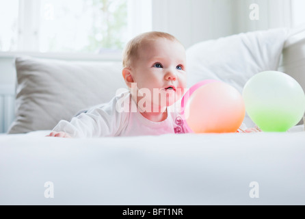 Baby with Balloons Banque D'Images