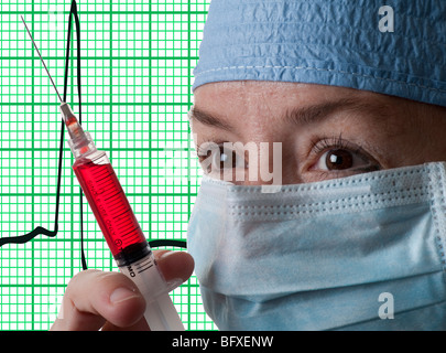 Technicien médical et de laboratoire de l'hôpital dans l'aiguille hypodermique