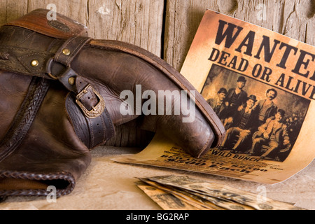 Bottes et des dollars américains de wild west voulait hors-la-loi Banque D'Images