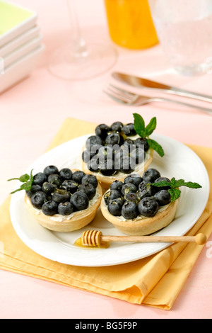 Tartelettes aux bleuets. Recette disponible. Banque D'Images