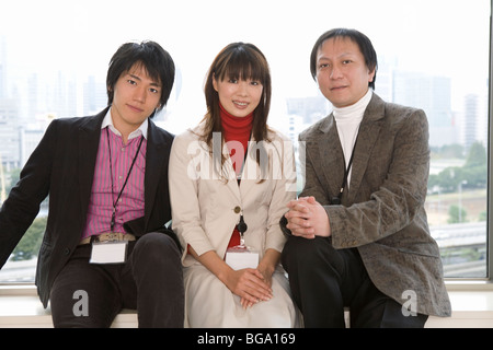 Portrait de trois personnes au bureau Banque D'Images