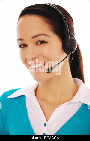 Jeune femme portant des écouteurs et microphone Banque D'Images