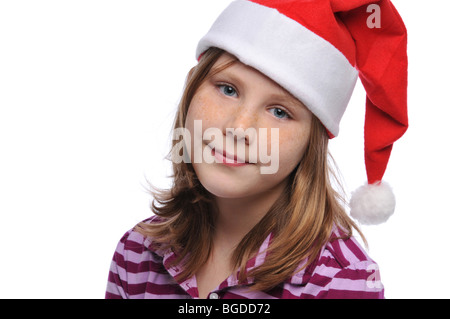 Le portrait de jeune fille Titlle wearing a Santa's hat isolé sur fond blanc Banque D'Images