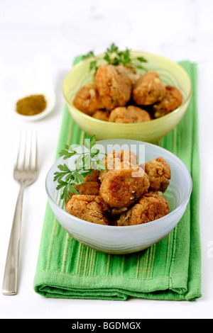 Boules de poisson au curry. Recette disponible. Banque D'Images