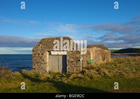 La construction du port désaffecté, Ballantrae, South Ayrshire, Ecosse. Banque D'Images