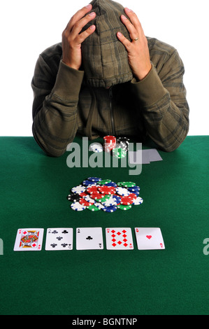 Poker player holding tête de désespoir Banque D'Images