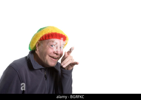 Silly old man wearing clown bonnet rasta. Banque D'Images