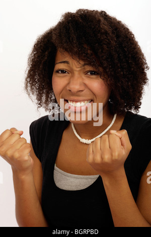 Jeune femme tendue avec les cheveux crépus Banque D'Images