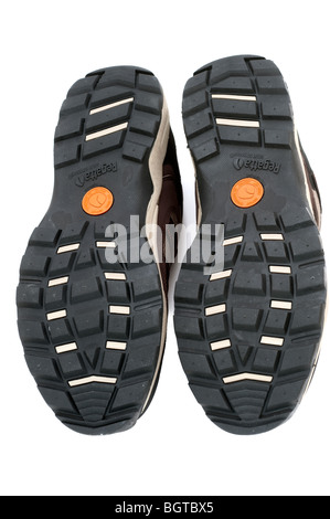 Les semelles en caoutchouc noir sur une paire de chaussures mens formateur en nylon taille 10 Banque D'Images