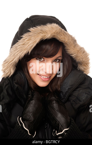 Femme portant des gants et parka noire Banque D'Images