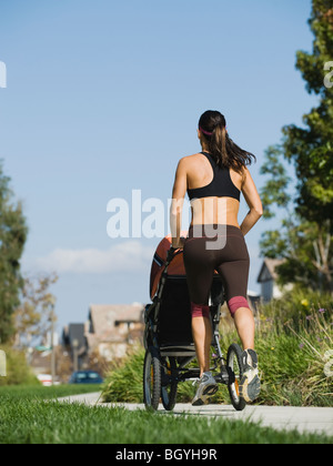 Jogger et bébé Banque D'Images