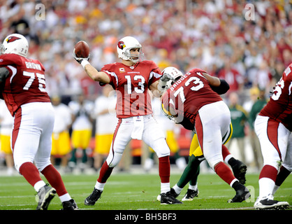 Kurt Warner # 13 de l'Arizona Cardinals passe contre les Packers de Green Bay dans le NFC wild-card match Banque D'Images