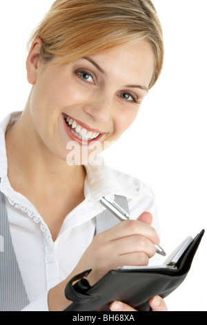 Businesswoman Writing in Diary Banque D'Images