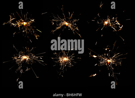 Noël spakrler combustion isolé sur fond noir Banque D'Images