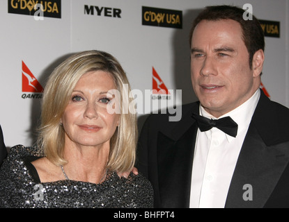 OLIVIA NEWTON-JOHN JOHN TRAVOLTA G'DAY USA USA 2010 gala cravate noire de LOS ANGELES HOLLYWOOD Los Angeles CA USA 16 janvier 2010 Banque D'Images