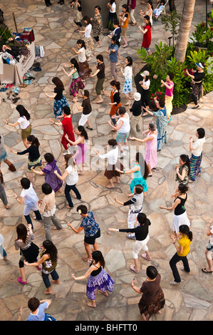 Classe de danse Hula, Waikiki, Honolulu, Oahu, Hawaii Banque D'Images