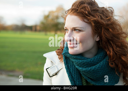 Portrait of a smiling red haired woman Banque D'Images