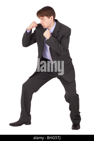 Businessman in boxing position de combat contre un fond blanc Banque D'Images
