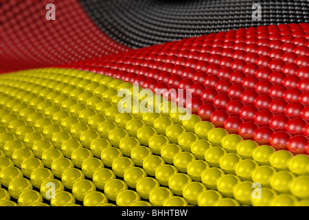 Vague de centaines de sphères réfléchissantes, brillant avec les couleurs de le drapeau allemand. Profondeur de champ. Banque D'Images