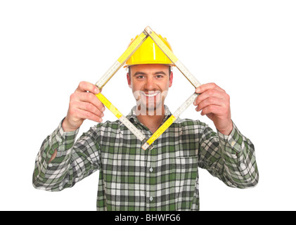 Homme à tout faire avec son outil mètre isolé sur fond blanc Banque D'Images