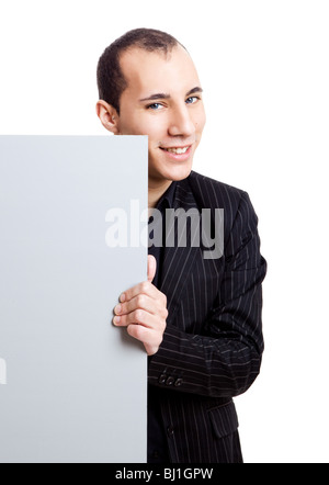 Businessman holding a blank billboard, isolé sur fond blanc Banque D'Images