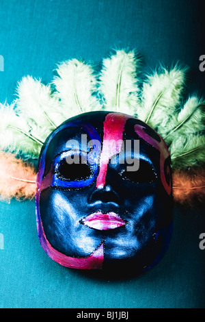 Masque de carnaval à la main Banque D'Images
