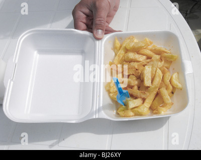 Jetons dans un essai avec une fourchette Banque D'Images