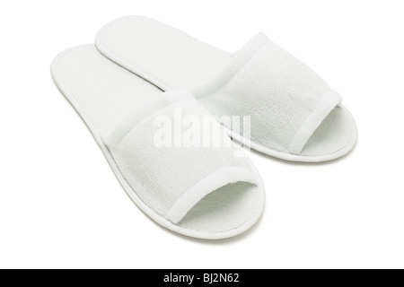 Chaussons accueil occasionnel blanc sur fond blanc Banque D'Images