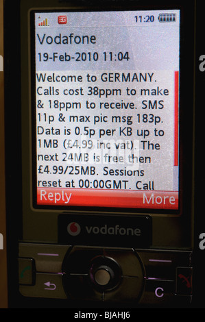 Téléphone mobile en utilisant le réseau Vodafone en Allemagne. Banque D'Images