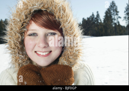 Portrait of teenage girl in hooded jacket Banque D'Images