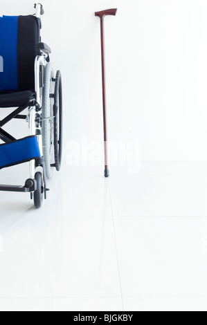Fauteuil roulant et canne à sucre Banque D'Images